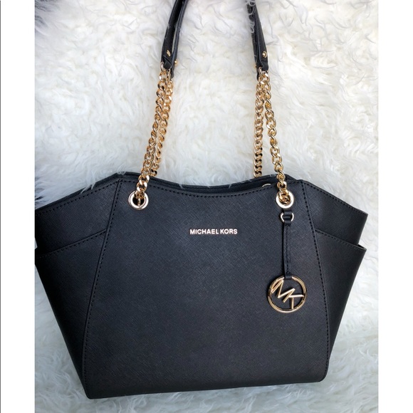 Michael Kors Handbags - SOLD - Michael Kors Black Jet Set Travel Bag